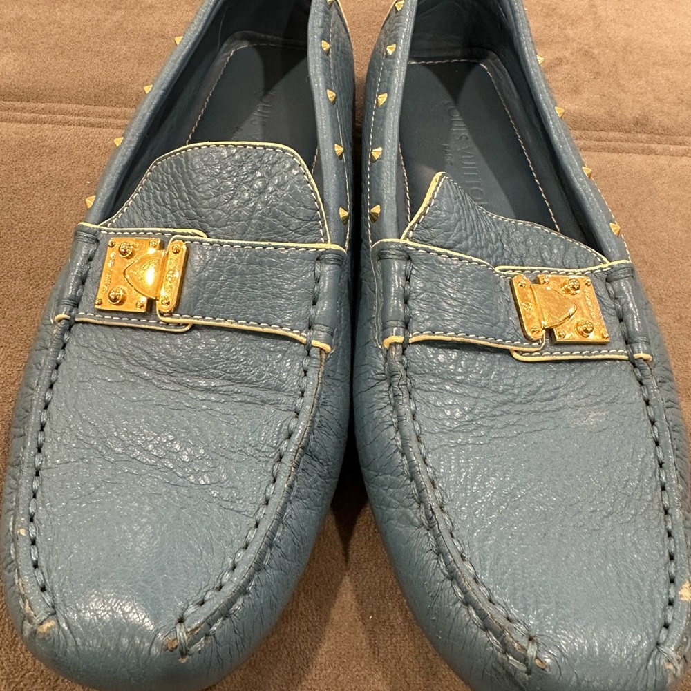Authentic Louis Vuitton blue studded loafers size 38 with scuffs and tears